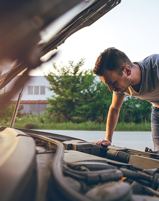 a person with mechanical trouble