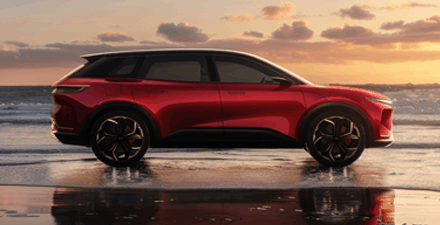 Red high-end SUB cruising along the shoreline