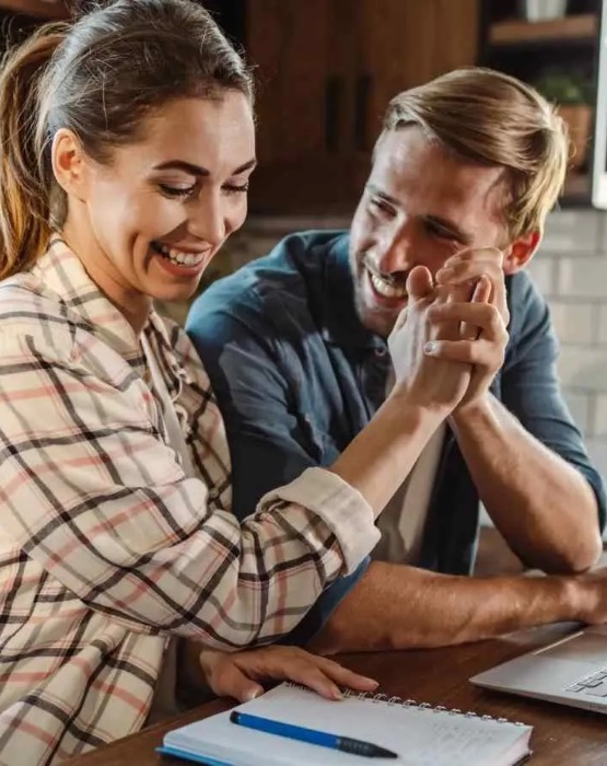 a couple of high-fiving each other
