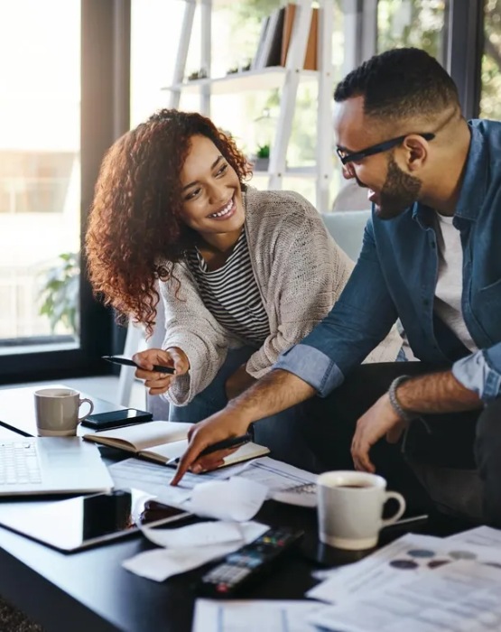 a couple smiling at each other