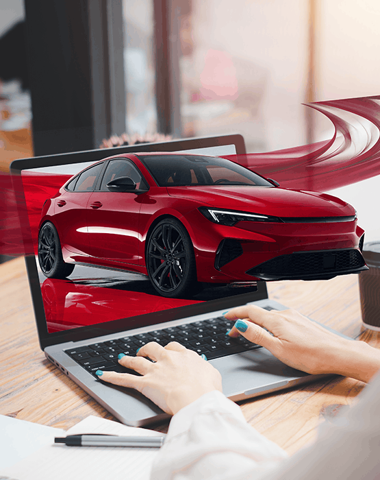 Woman shopping for a car on a laptop