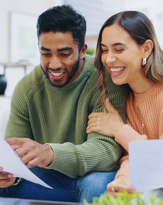 a couple reviewing documents