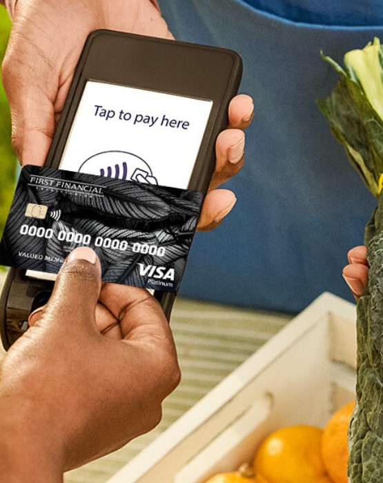 a person making a card purchase on a mobile device