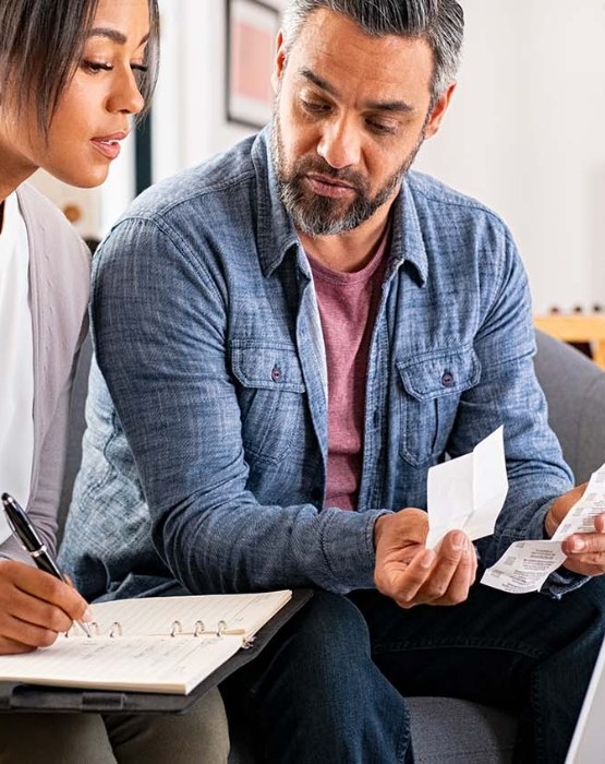 a couple budgeting their finances