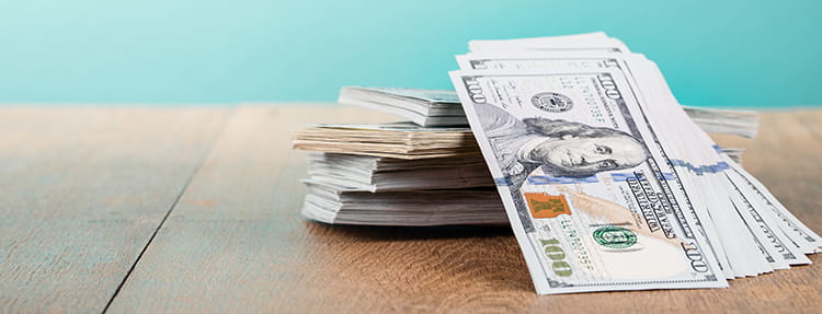 Stack of money on a table
