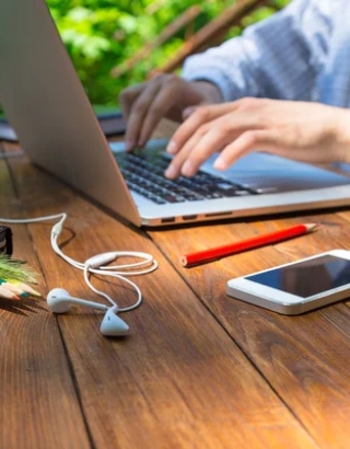 a person working on their laptop computer