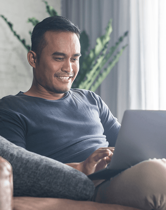 Man looking at laptop screen