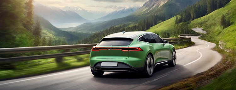 Electric vehicle is driving on a winding road that runs through a forest and mountains.