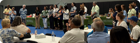 Members, staff and volunteers in attendance.